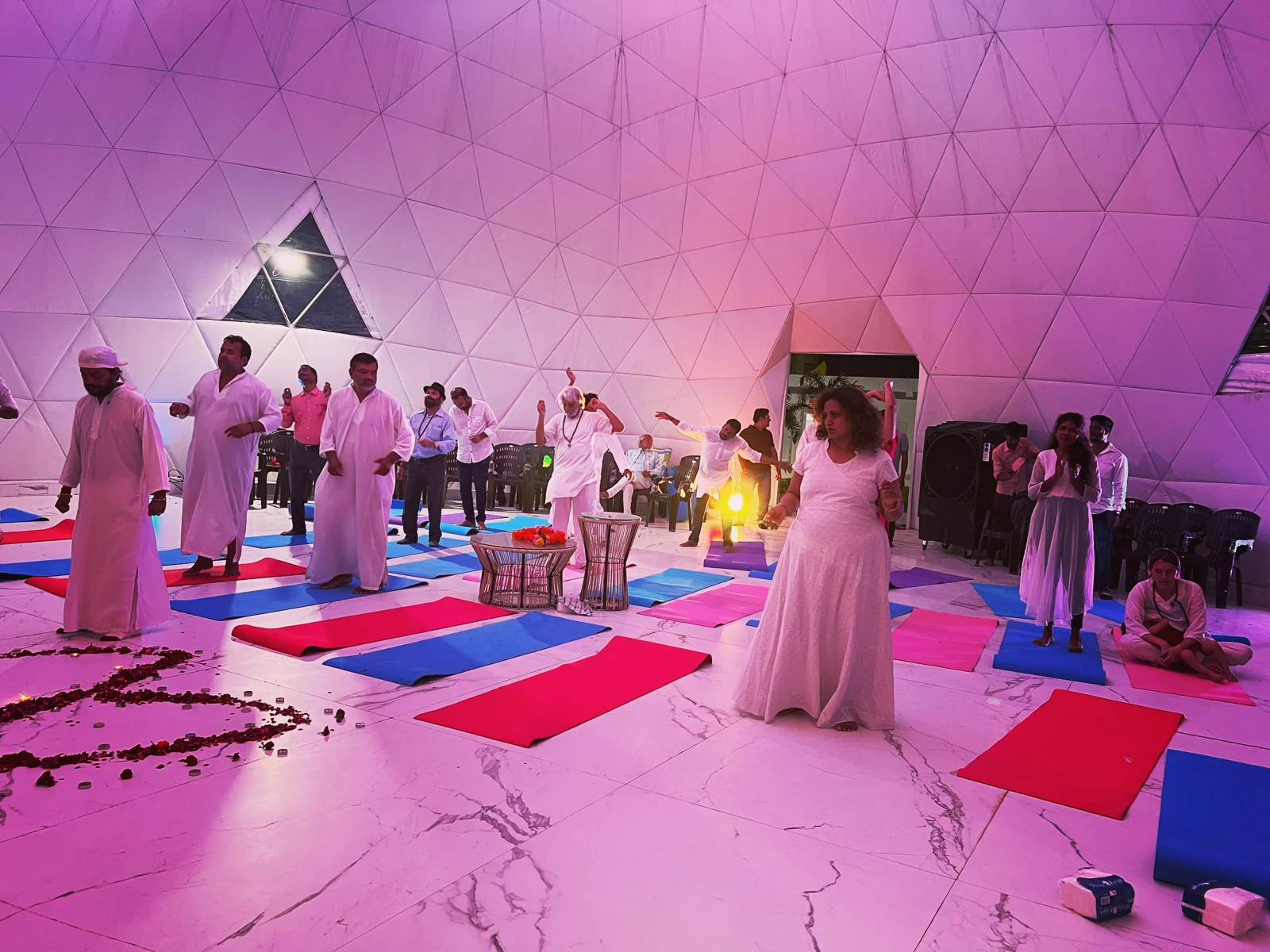 A past meditation gathering inside the geodesic hall at Osho Home Ashram